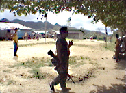 Market day. The police on patrol.