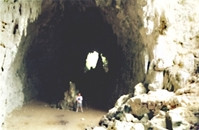 John Russell standing in the cave early 90's