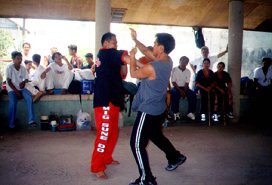 Master Alberto "Jhun" Dacayana JR and student during a demonstration.