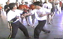 Video freeze of the1998 WEKAF Balintawak demonstration headed by Nick Elizar.