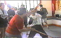 Video freeze of the1998 WEKAF Balintawak demonstration headed by Nick Elizar.