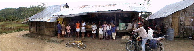 My transportation and a quick stop at the market in a mountain barangay.